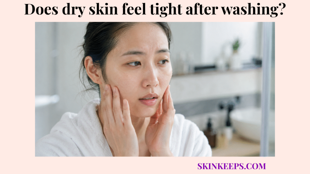 Woman touching tight, dry-feeling skin after washing her face.